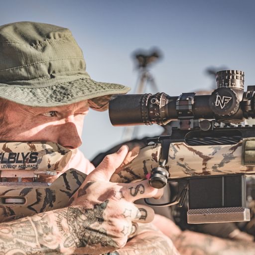 Marksman behind a Nightforce-equipped rifle