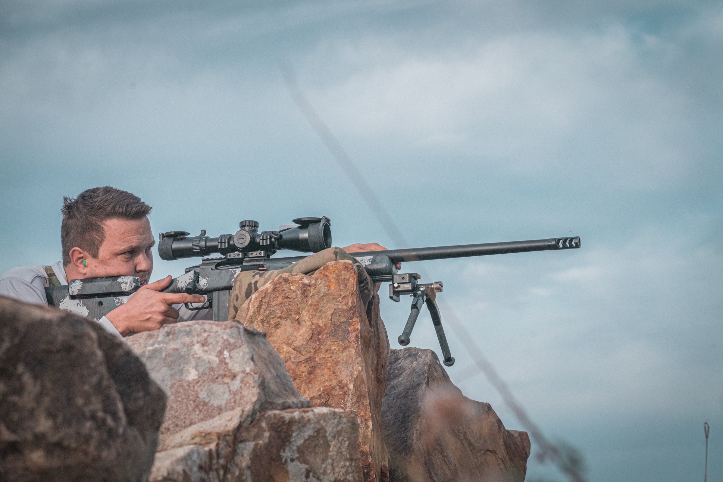 Long-range shooter on rocky terrain